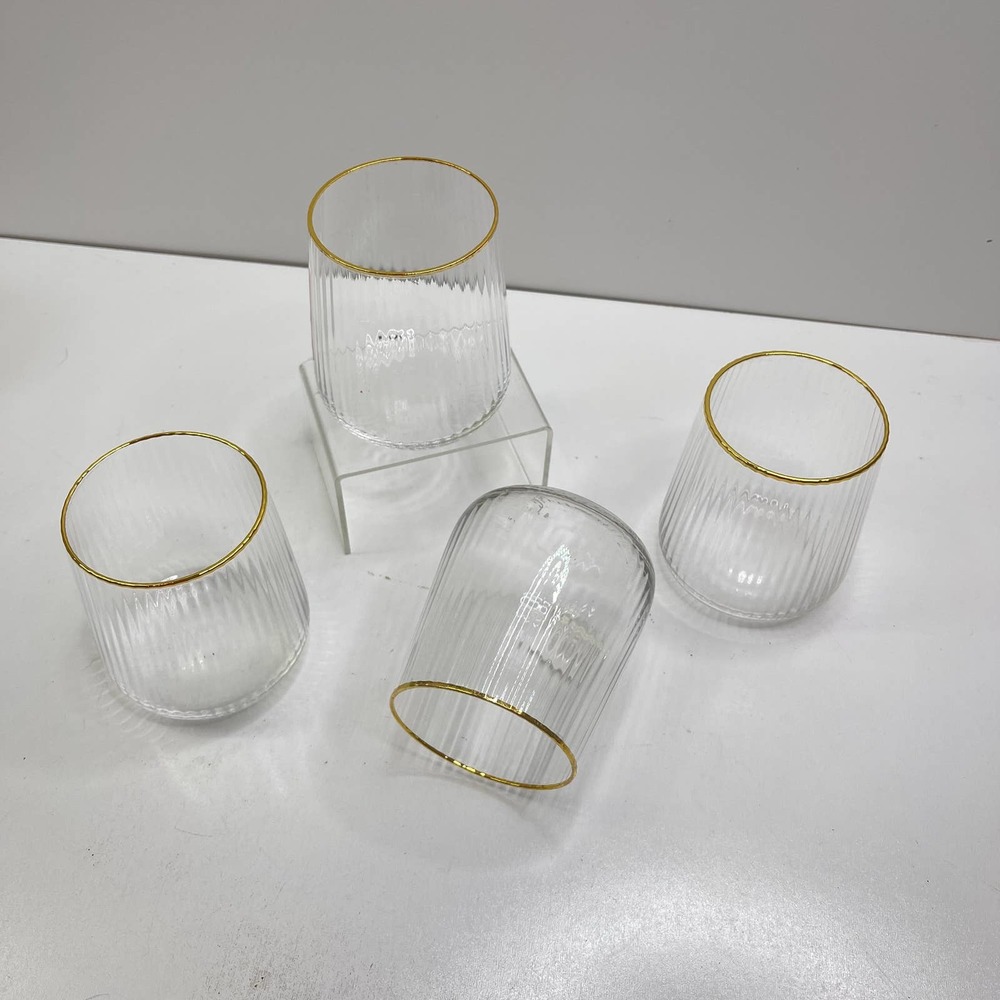 Anthropoligie Clear Ribbed Glasses with Gold Trim. Simply Stunning!